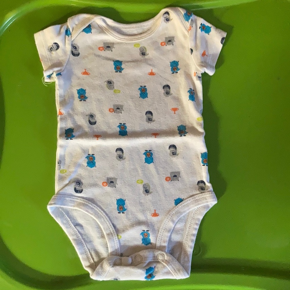 One onesie with little monsters